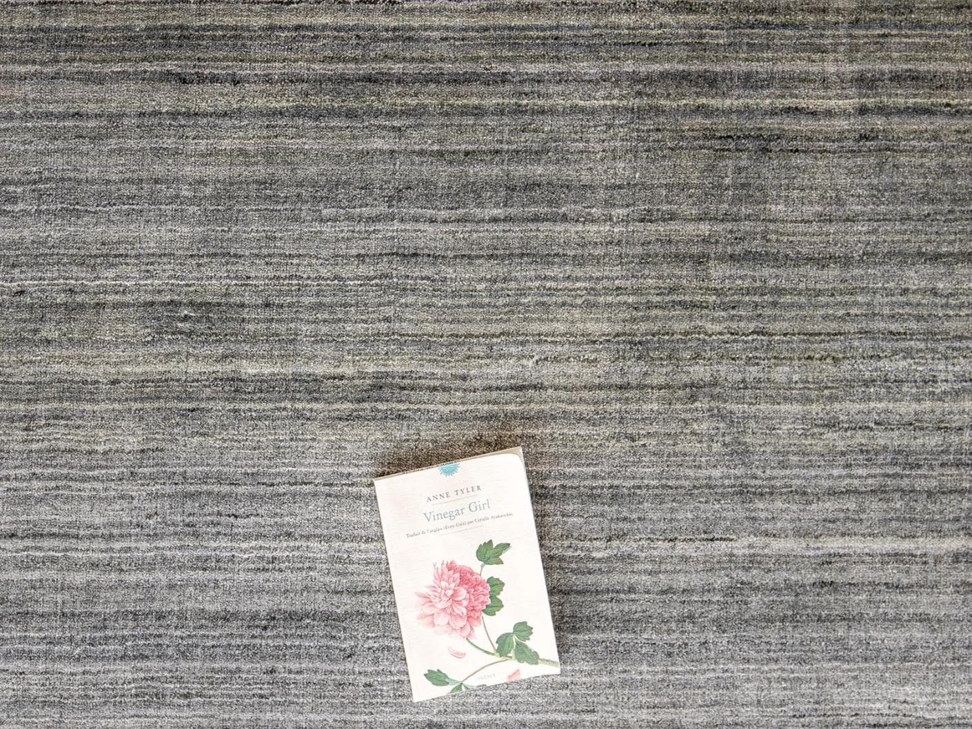 Ava Ashton carpets in grey and charcoal, shown in a lifestyle top view as image 3