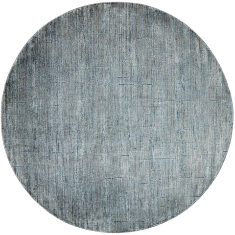 Caleb Ashton carpets in grey, teal and blue, shown in a product top view as image 1