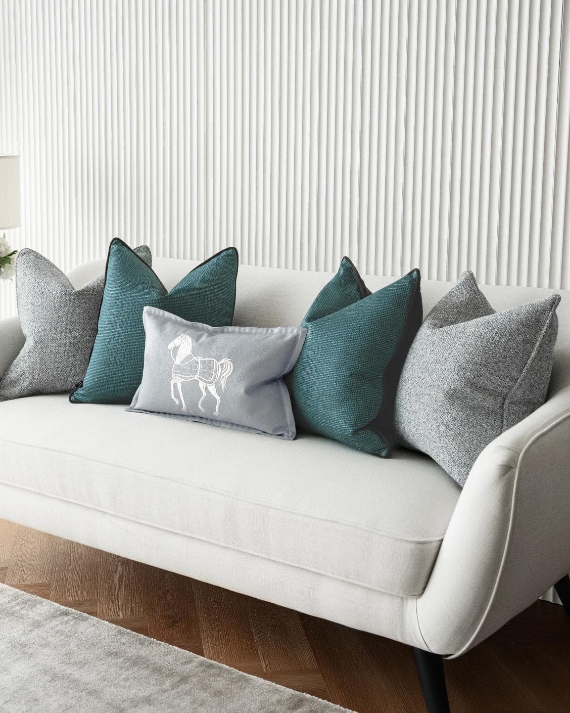 Henrich Bundle cushion in blue, shown in a lifestyle right view as image 2