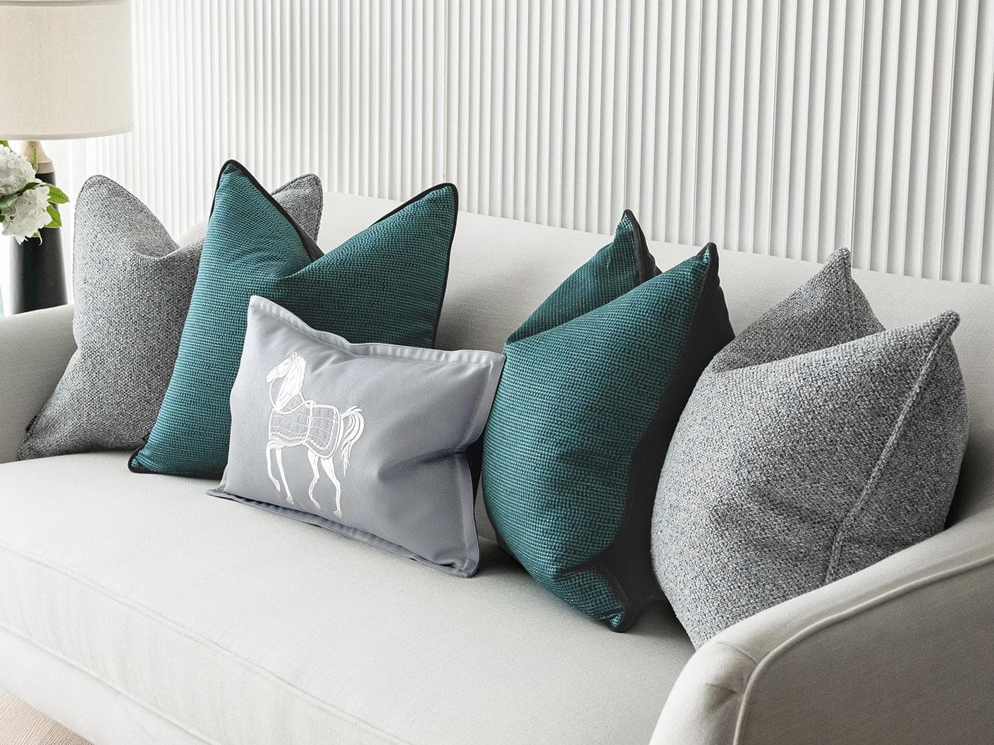 Henrich Bundle cushion in blue, shown in a lifestyle right view as image 5