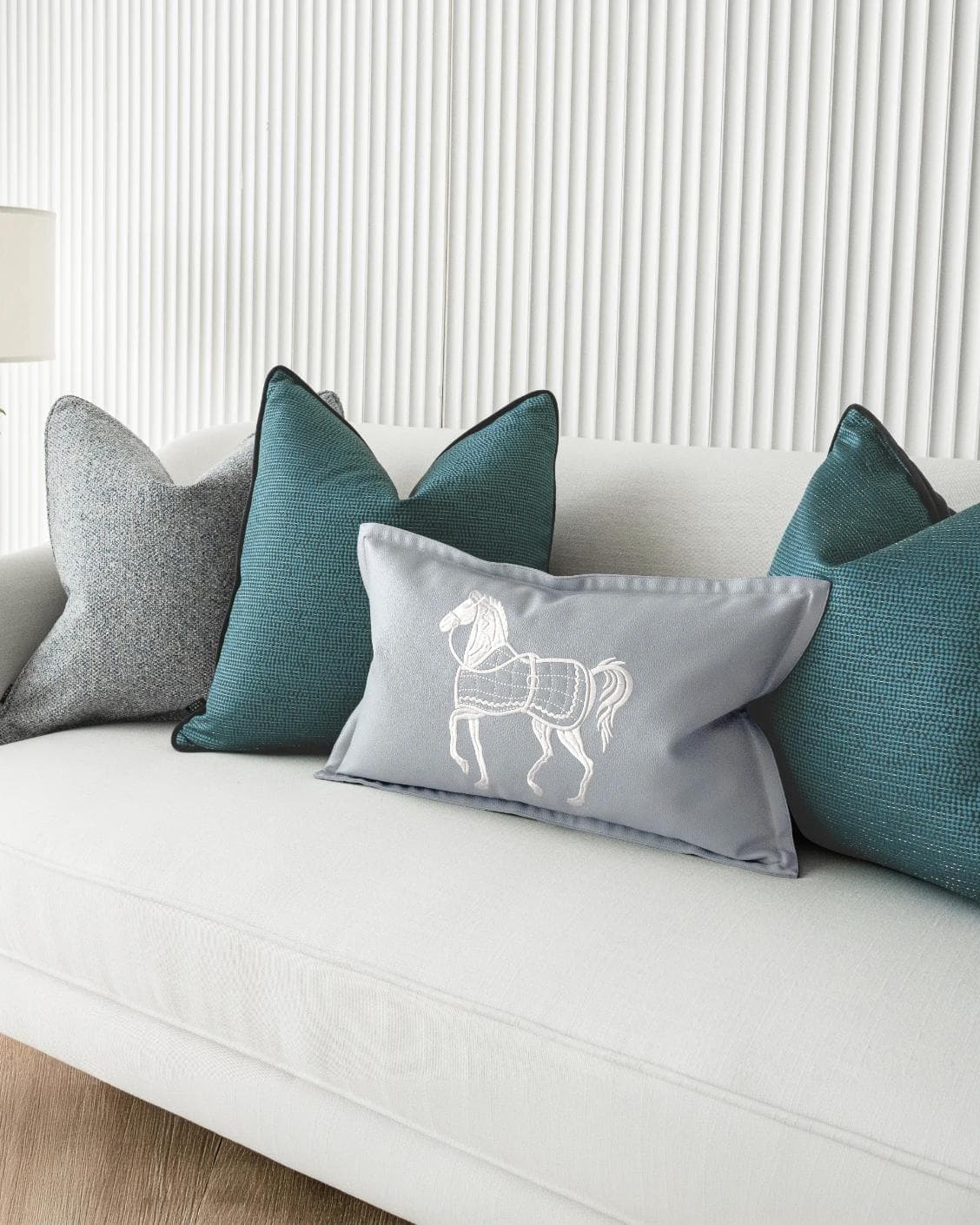 Henrich Bundle cushion in blue, shown in a product right view as image 7