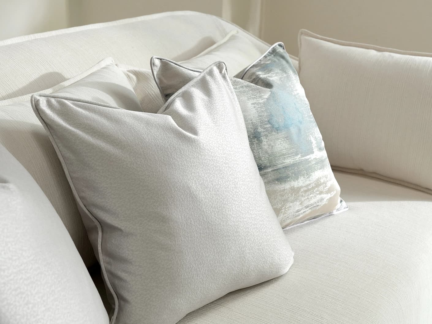 Celia Bundle cushion in blue and silver, shown in a lifestyle right view as image 5
