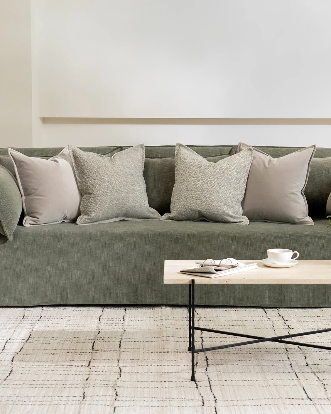 Ezra Bundle cushion in beige, shown in a lifestyle front view as image 4