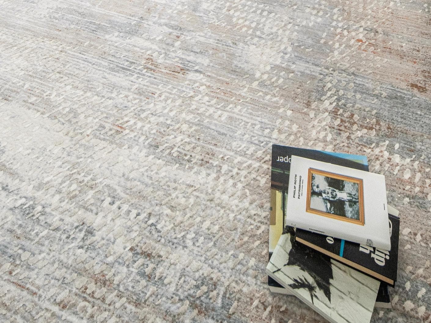 Savanna Sandy carpet in beige and rust, shown in a lifestyle close-up as image 5