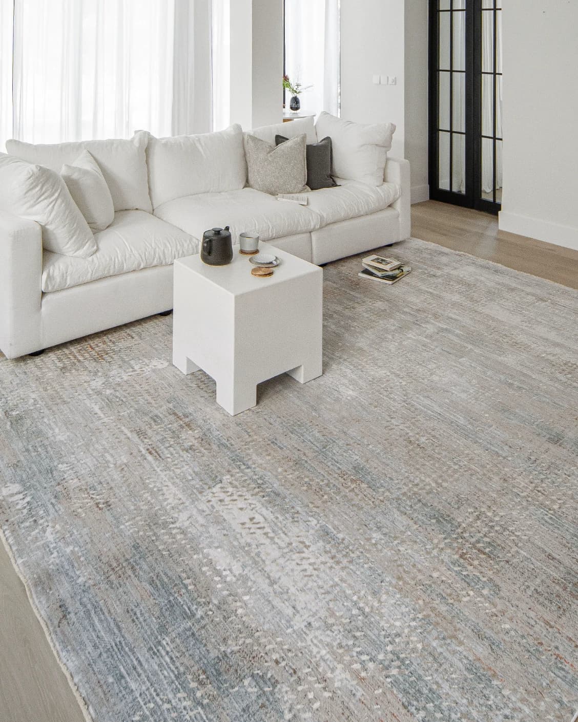 Savanna Sandy carpet in beige and rust, shown in a lifestyle left view as image 8