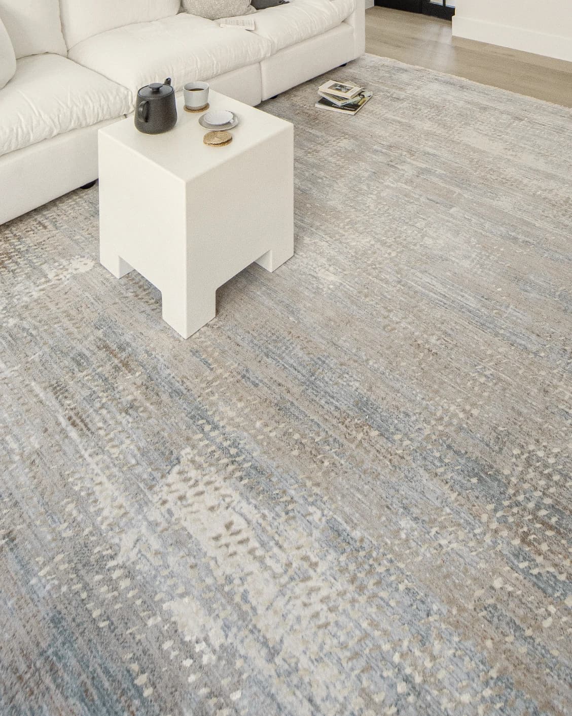 Savanna Sandy carpet in beige and rust, shown in a lifestyle left view as image 9