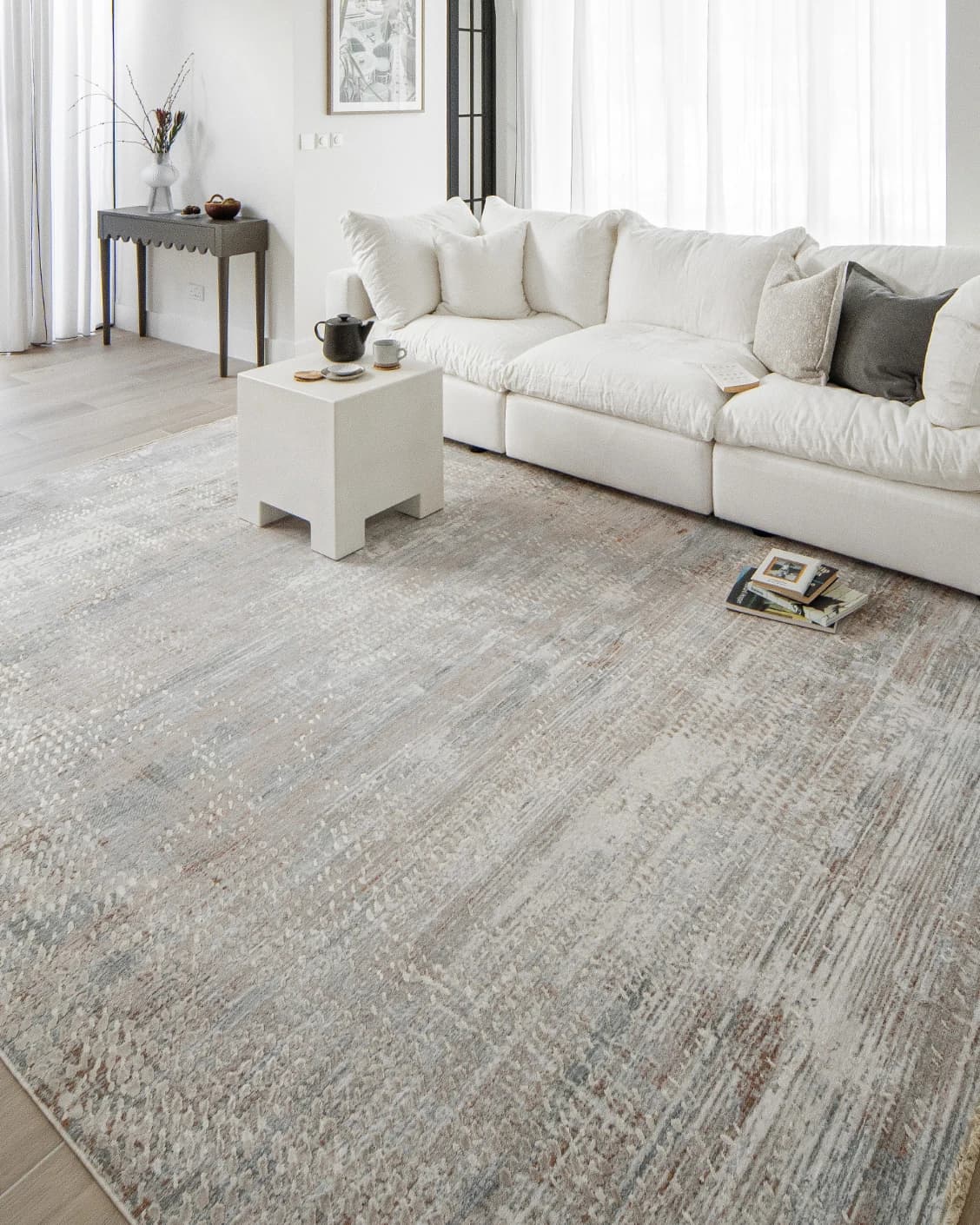 Savanna Sandy carpet in beige and rust, shown in a lifestyle right view as image 10