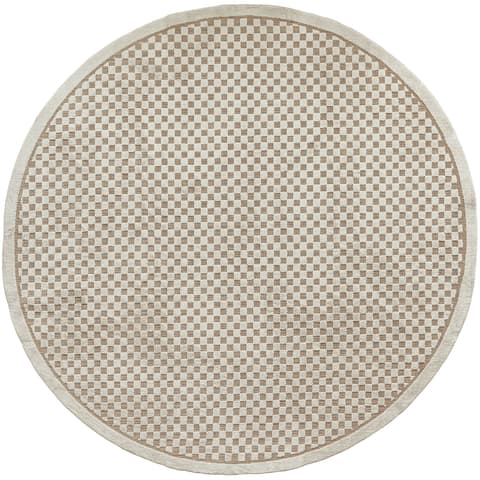 Milo Sandy Round carpet in beige, shown in a product top view as image 1