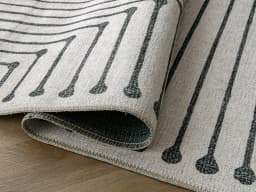 Vince Bianca Runners carpet in black and white, shown in a lifestyle front view