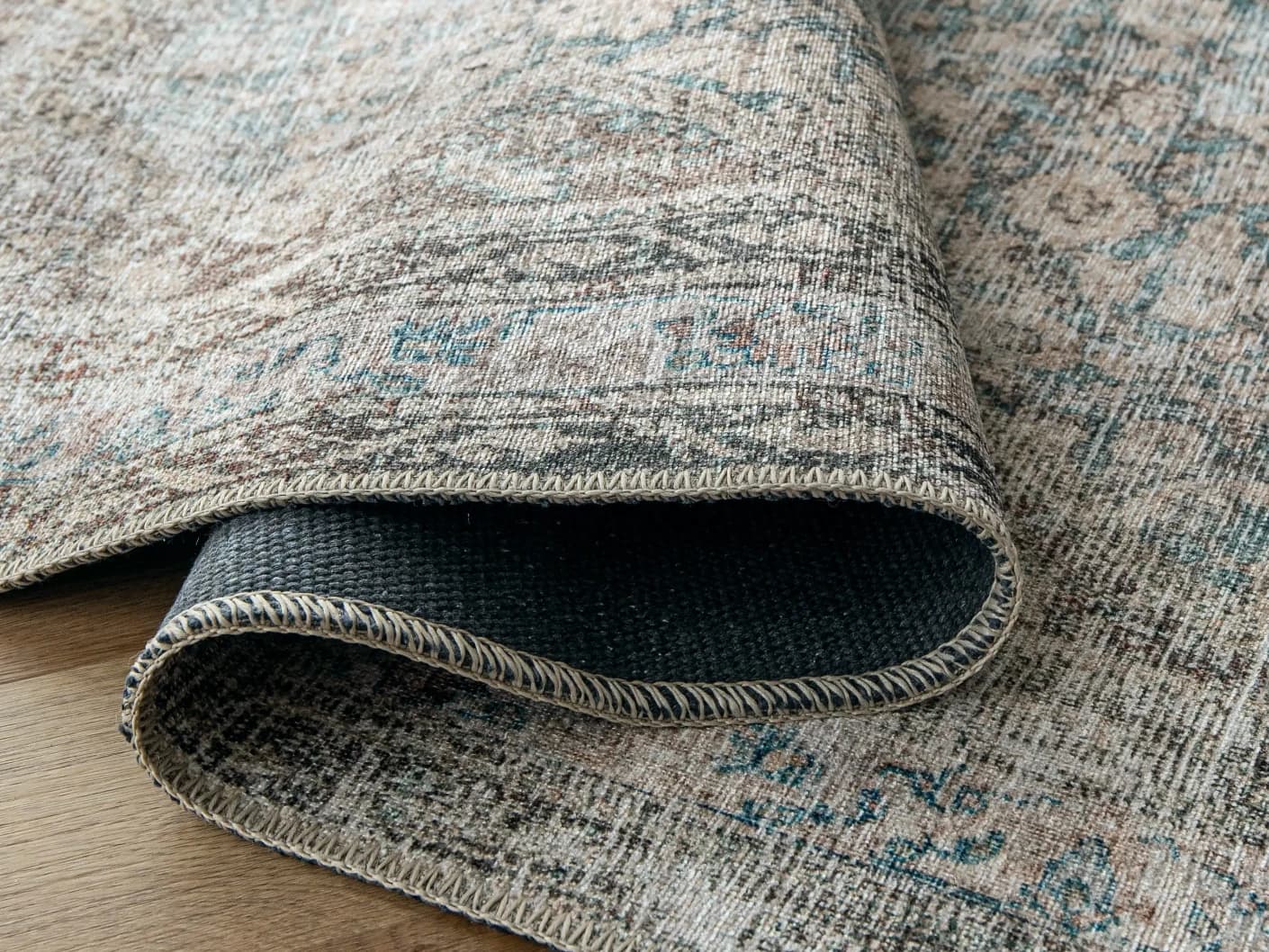Vince Mira carpet in grey, shown in a lifestyle front view as image 4