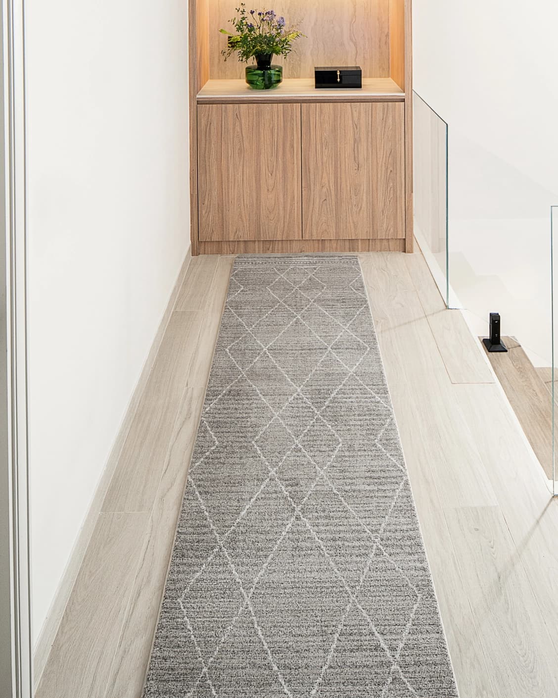 Zen Dune Runners carpet in grey and off white, shown in a lifestyle front view