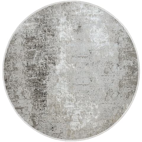 Jacob Ashton Round carpet in grey, silver and white, shown in a product top view as image 1