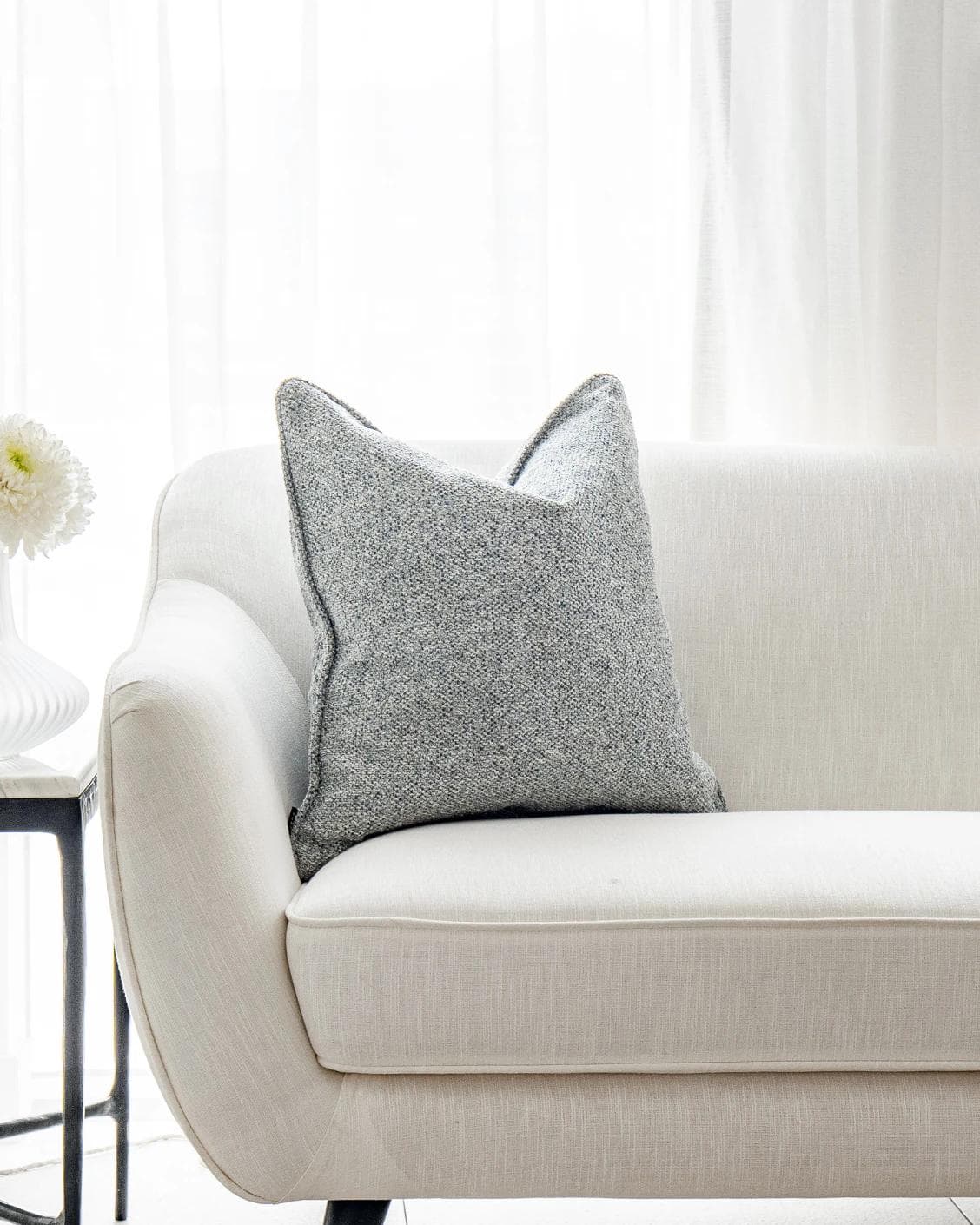Oscar Canova cushion in blue, shown in a lifestyle as image 2
