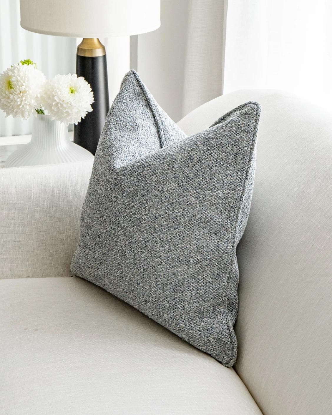 Oscar Canova cushion in blue, shown in a lifestyle right view as image 5