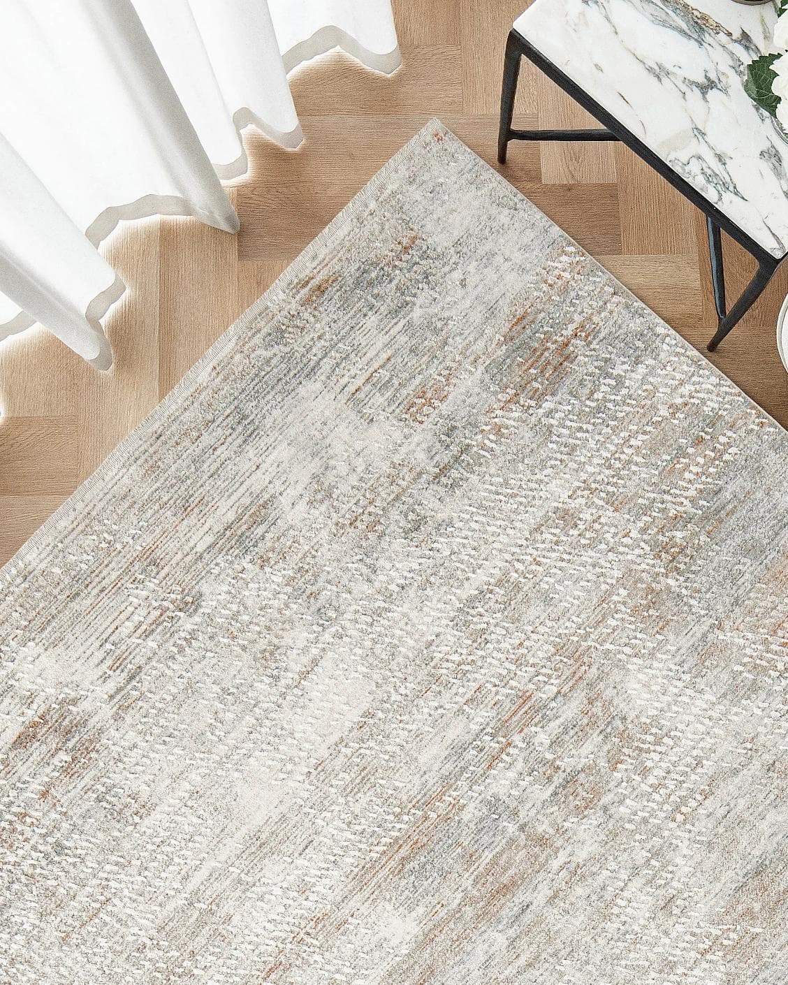 Savanna Sandy carpet in beige and rust, shown in a lifestyle top view as image 2