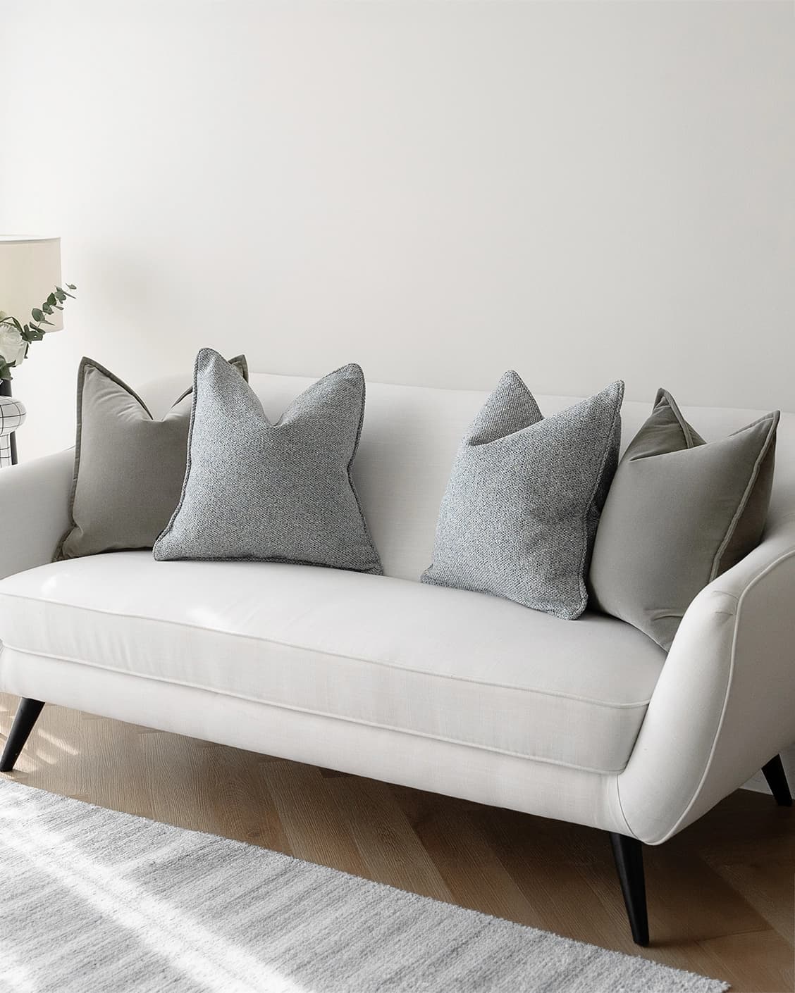 Tom Bundle cushion in grey and blue, shown in a lifestyle right view as image 2