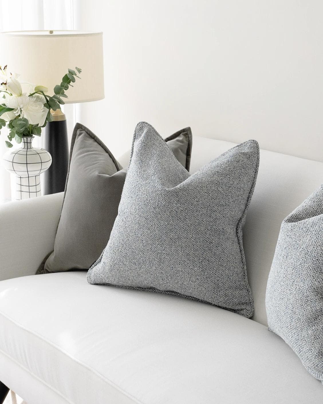 Tom Bundle cushion in grey and blue, shown in a lifestyle right view as image 5