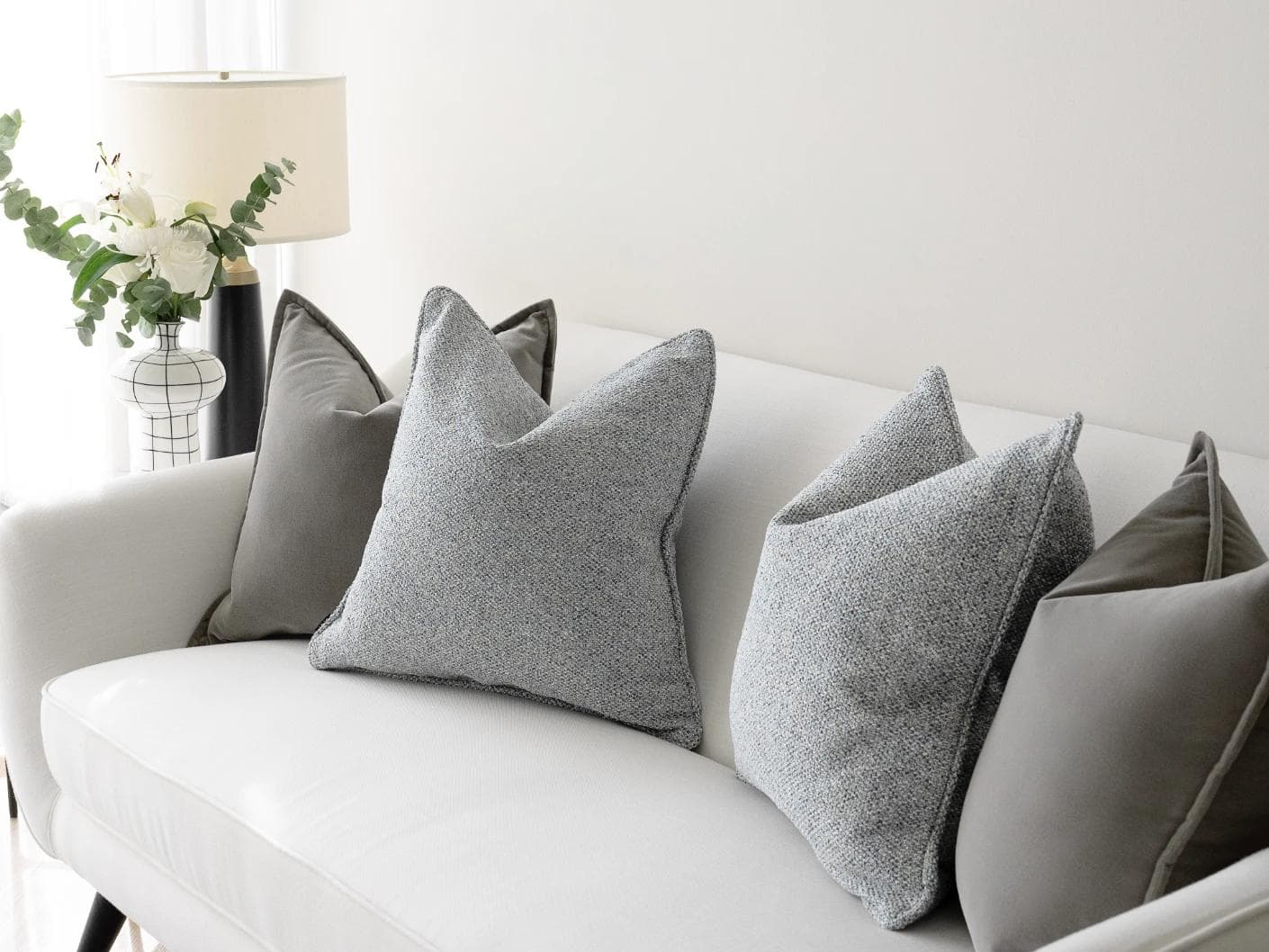Tom Bundle cushion in grey and blue, shown in a lifestyle right view as image 5