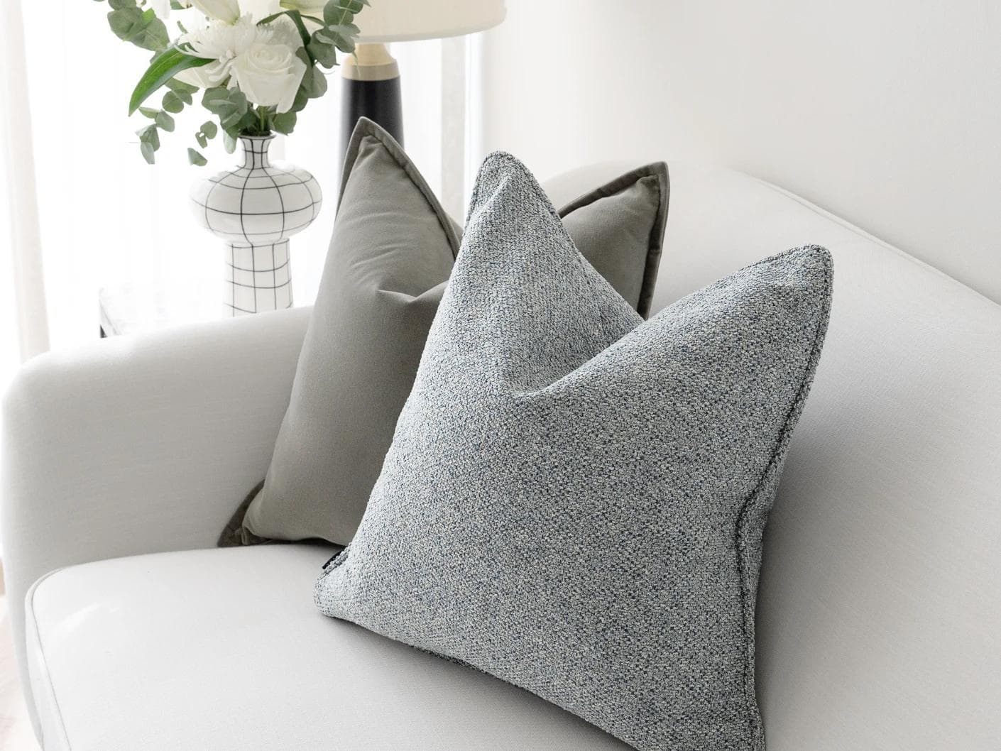 Tom Bundle cushion in grey and blue, shown in a lifestyle right view as image 6