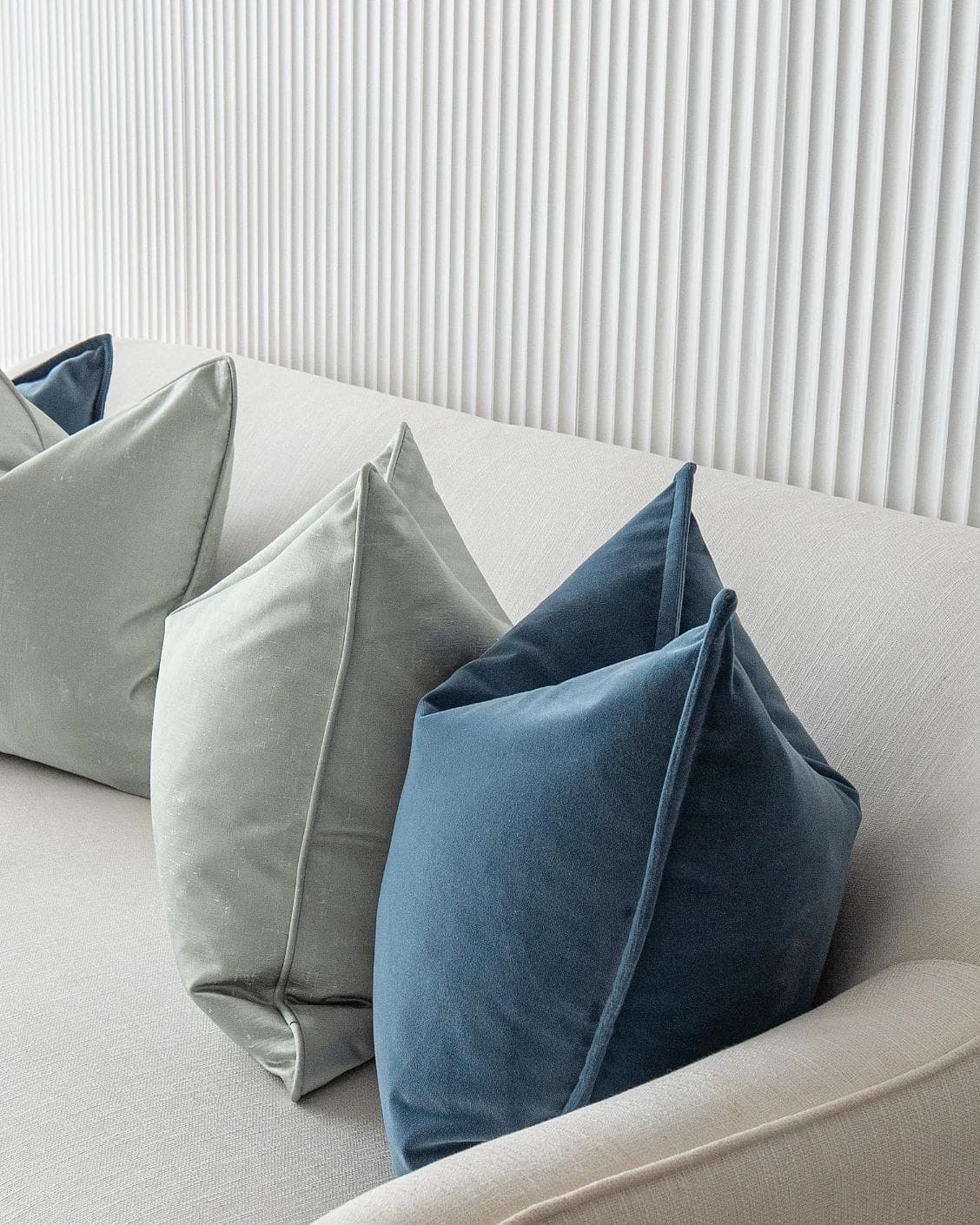 Vladimir Bundle cushion in blue, green and silver, shown in a product right view as image 7