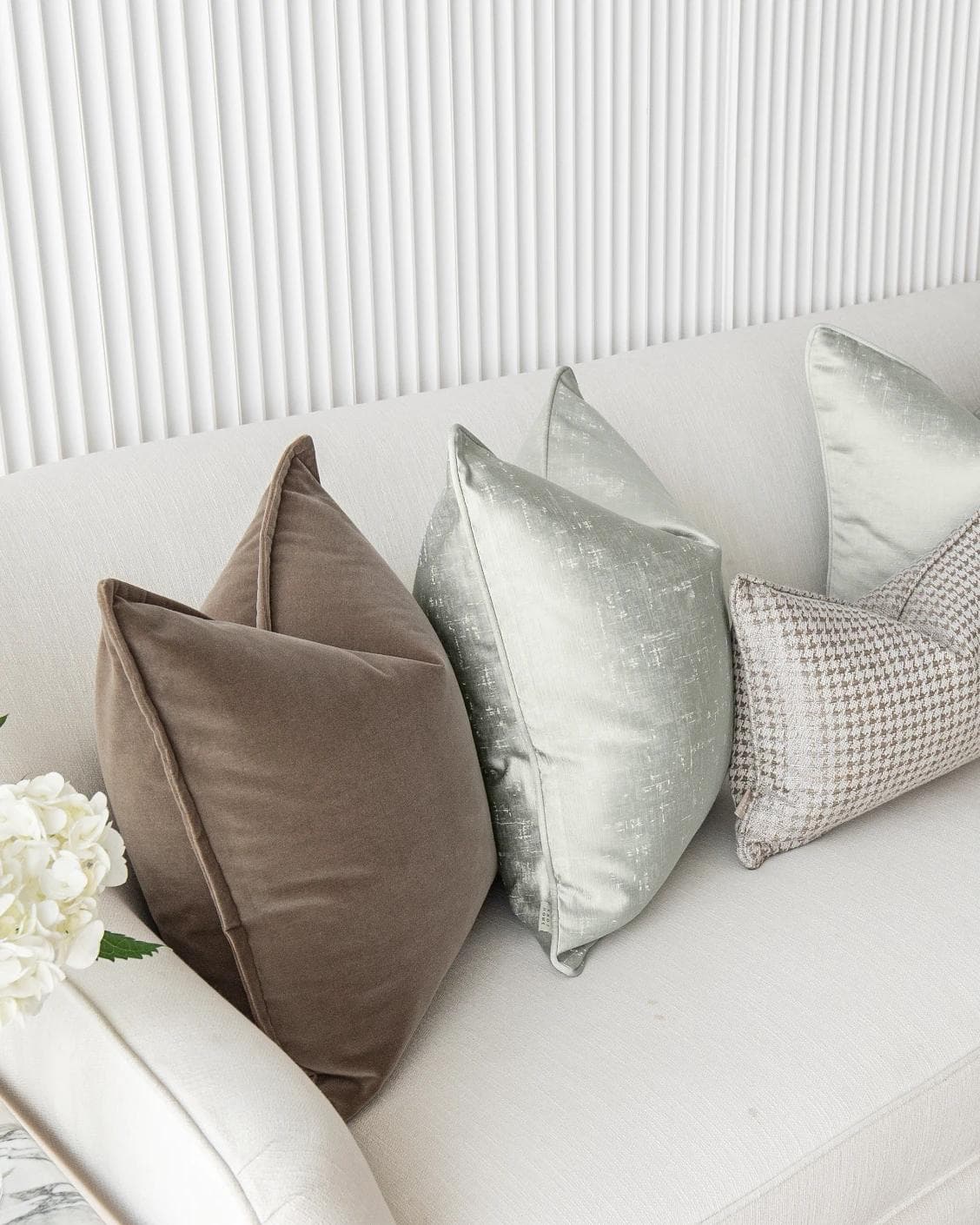 Amaris Bundle cushion in brown, green and silver, shown in a lifestyle left view as image 5
